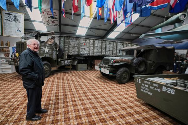 Director of the WWII Remember Museum 1939-1945, Marcel Schmetz, stands near vintage WWII vehicles inside his museum in Thimister-Clermont, Belgium, April 22, 2025. (AP Photo/Virginia Mayo)