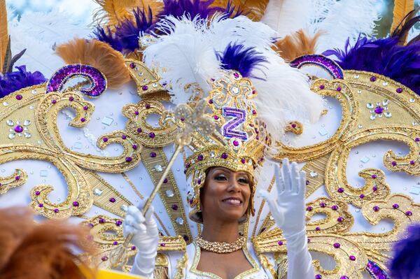 FILE - Zulu queen Crystal Monique Guillemet waves to the crowd during the Zulu Social Aid and Pleasure Club parade on Mardi Gras in New Orleans on March 1, 2022. (Chris Granger/The Times-Picayune/The New Orleans Advocate via AP, File)