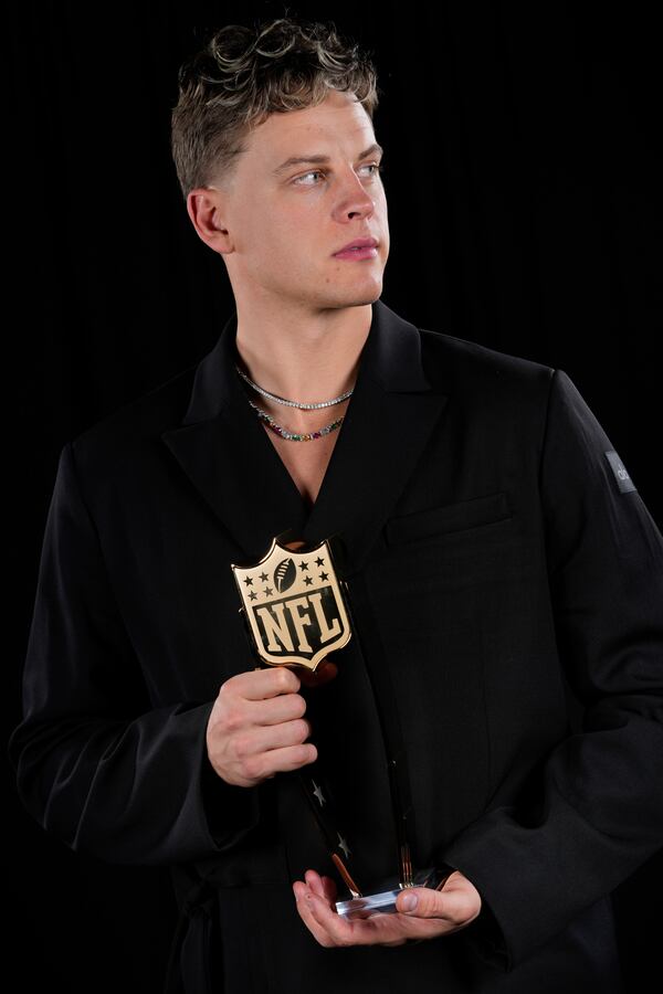 Cincinnati Bengals' Joe Burrow, AP NFL Comeback Player of the Year, poses after winning the award at the NFL Honors award show ahead of the Super Bowl 59 football game, Thursday, Feb. 6, 2025, in New Orleans. (AP Photo/Matt York)