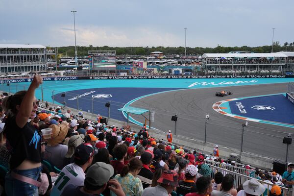 Fans cheer from the stands during the Formula One Miami Grand Prix auto race Sunday, May 4, 2025, in Miami Gardens. Fla. (AP Photo/Rebecca Blackwell)