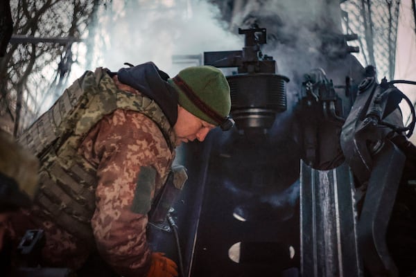 Ukrainian servicemen fire a M777 howitzer towards Russian positions at the frontline near Donetsk, Ukraine, Monday, March 3, 2025. (AP Photo/Roman Chop)