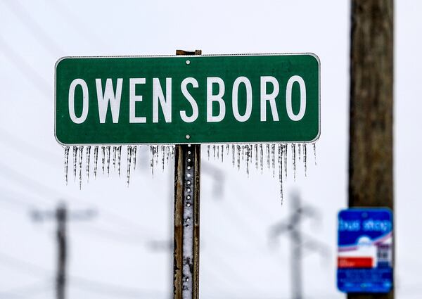 Icicles hang from a sign entering the city of Owensboro, Ky, Wednesday, Jan. 8, 2025, as rigidly cold weather sets in after winter storm Blair. (Greg Eans/The Messenger-Inquirer via AP)