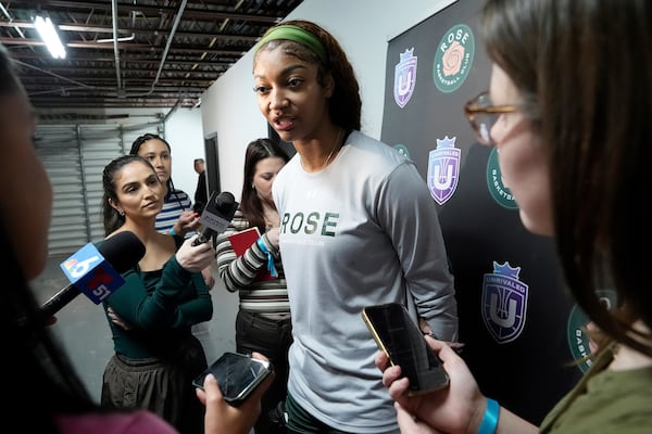 Rose player Angel Reese speaks following a practice session, Thursday, Jan. 16, 2025, in Medley, Fla., as the new 3-on-3 women's basketball league Unrivaled tips off this weekend. (AP Photo/Marta Lavandier)