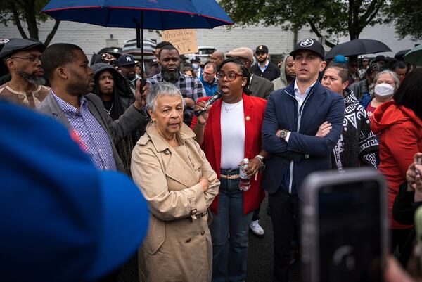 Rep. LaMonica McIver, center, demands the release of Newark Mayor Ras Baraka after his arrest while protesting outside an ICE detention prison, Friday, May 9, 2025, in Newark, N.J, (AP Photo/Angelina Katsanis)