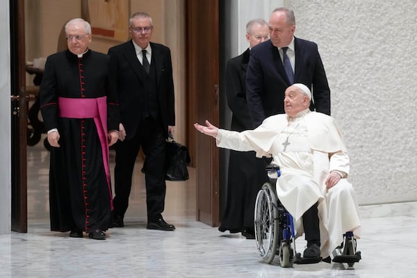 Pope Francis arrives in the Paul VI hall on the occasion of the weekly general audience at the Vatican, Wednesday, Jan. 15, 2025. (AP Photo/Gregorio Borgia)