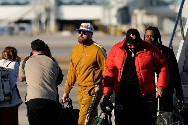 Kansas City Chiefs tight end Travis Kelce arrives at New Orleans international airport, Sunday, Feb. 2, 2025, in Kenner, La. ahead of the NFL Super Bowl 59 football game between the Philadelphia Eagles and the Kansas City Chiefs. (AP Photo/David J. Phillip)