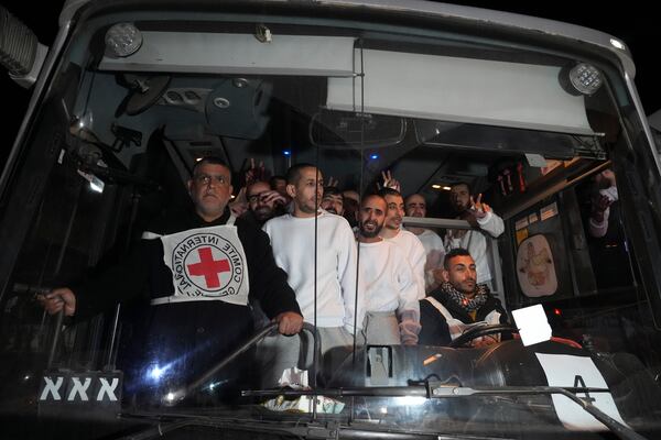 Freed Palestinian prisoners arrive in the Gaza Strip after being released from an Israeli prison following a ceasefire agreement between Hamas and Israel in Khan Younis, Gaza Strip, Thursday, Feb. 27, 2025. (AP Photo/Abdel Kareem Hana)