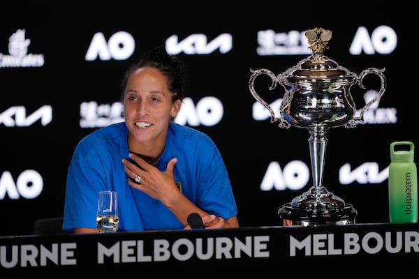 Madison Keys of the U.S. speaks during a press conference after defeating Aryna Sabalenka of Belarus in the women's singles final at the Australian Open tennis championship to win the Daphne Akhurst Memorial Cup, in Melbourne, Australia, Saturday, Jan. 25, 2025. (AP Photo/Vincent Thian)