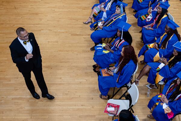 Christian Adair explains the run of show to graduates ahead of the Senior Salute at Lyric Theatre in Lexington, Kentucky, Wednesday, May 7, 2025. (AP Photo/Jon Cherry)