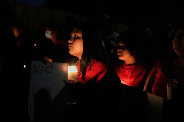 FILE - People attend a vigil for slain Native American teen Emily Pike in Mesa, Ariz., Thursday, March 6, 2025. (AP Photo/Samantha Chow, file)
