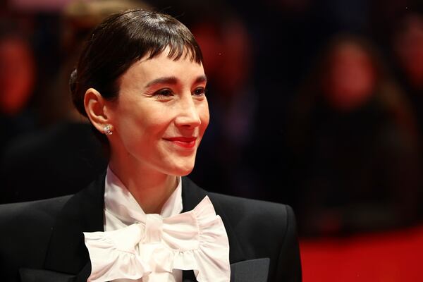 Actress Sibel Kekilli poses for photographers upon arrival at the opening of the International Film Festival, Berlinale, in Berlin, Thursday, Feb. 13, 2025. (Christoph Soeder/dpa via AP)