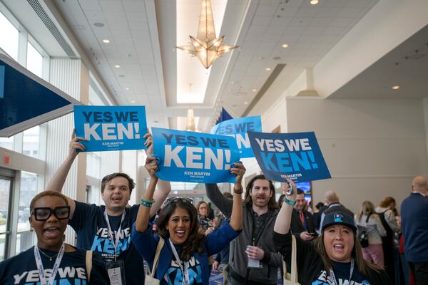 Supporters and volunteers of DNC chair candidate Ken Martin cheer outside of the ballroom in the hours prior to the votes for positions at the Democratic National Committee Winter Meeting at the Gaylord National Resort and Convention Center in National Harbor, Md., Saturday, Feb. 1, 2025. (AP Photo/Rod Lamkey, Jr.)