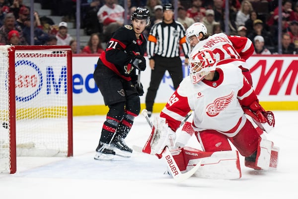 Detroit Red Wings goaltender Cam Talbot (39) watches the puck enter his net for a goal by Ottawa Senators forward David Perron (not shown) during second-period NHL hockey game action in Ottawa, Ontario, Monday, March 10, 2025. (Spencer Colby/The Canadian Press via AP)