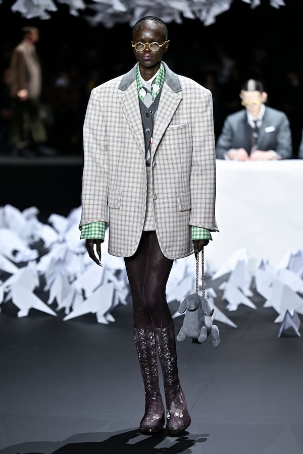 A model walks the runway during the Thom Browne Fall/Winter 2025 fashion show as part of New York Fashion Week on Tuesday, Feb. 11, 2025, at The Shed in New York. (Photo by Evan Agostini/Invision/AP)