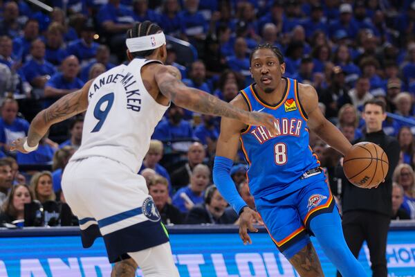 Oklahoma City Thunder forward Jalen Williams (8) drives against Minnesota Timberwolves guard Nickeil Alexander-Walker (9) during the first half of Game 2 of an NBA basketball Western Conference Finals playoff series Thursday, May 22, 2025, in Oklahoma City. (AP Photo/Nate Billings)