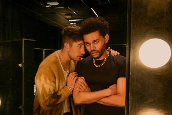 This image released by Lionsgate shows Barry Keoghan as Lee, left, and Abel "The Weeknd" Tesfaye as Abel in a scene from "Hurry Up Tomorrow." (Andrew Cooper/Lionsgate via AP)