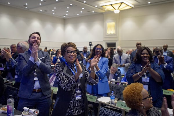 Attendees cheer as Ken Martin is announced as the newly elected Democratic National Committee Chairman after winning the vote at the Democratic National Committee Winter Meeting at the Gaylord National Resort and Convention Center in National Harbor, Md., Saturday, Feb. 1, 2025. (AP Photo/Rod Lamkey, Jr.)