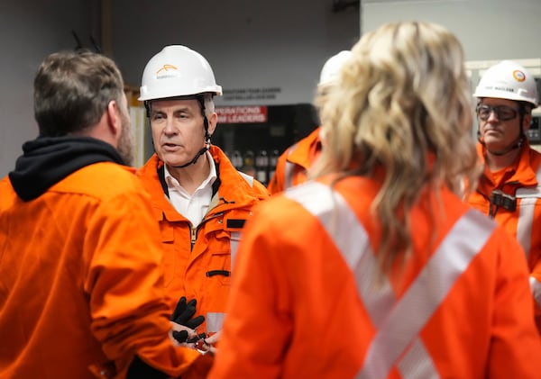 Canadian Prime Minister designate Mark Carney, second left, tours the ArcelorMittal Dofasco steel plant in Hamilton, Ontario, on Wednesday, March 12, 2025. (Nathan Denette/The Canadian Press via AP)