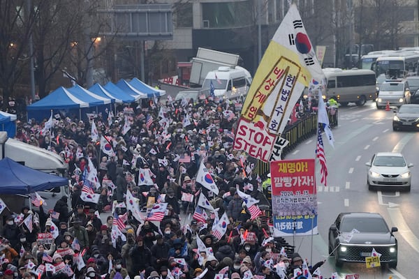 Supporters of impeached South Korean President Yoon Suk Yeol stage a rally to oppose his impeachment near the presidential residence in Seoul, South Korea, Monday, Jan. 6, 2025. (AP Photo/Ahn Young-joon)