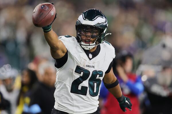 FILE - Philadelphia Eagles running back Saquon Barkley (26) reacts after a run against the Los Angeles Rams during the second half of an NFL football game in Inglewood, Calif., Sunday, Nov. 24, 2024. (AP Photo/Ryan Sun, File)