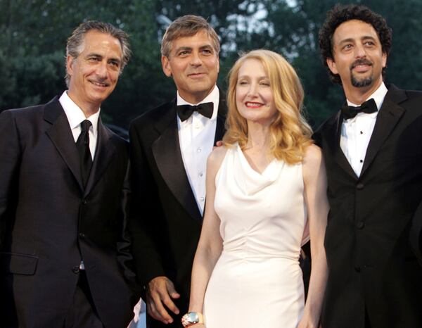 FILE - Actor David Strathairn, from left, writer-director-producer George Clooney, actor Patricia Clarkson, and producer Grant Heslov, appear at the screening of their film, "Good Night, and Good Luck" at the 62nd edition of the Venice Film Festival in Venice, northern Italy, on Sept. 1, 2005. (AP Photo/Domenico Stinellis, File)