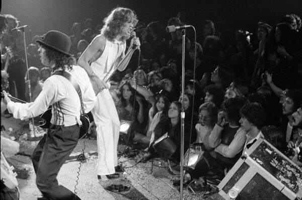 FILE - Rock group "The New York Dolls" perform at the Waldorf Halloween Ball, Waldorf-Astoria Hotel, NYC, Oct. 31, 1973. At right is lead singer David Johansen, with guitarist Sylvain Sylvain. (AP Photo/Richard Drew, File)