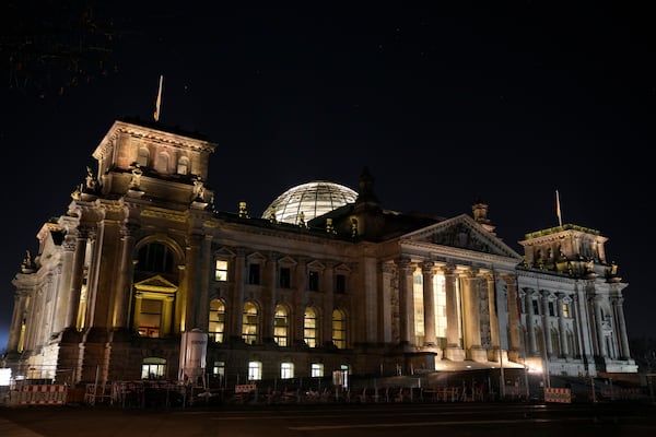 Exterior view of the Reichstag building, home of the German federal parliament, Bundestag, in Berlin, Germany, Sunday, March 23, 2025. (AP Photo/Ebrahim Noroozi)