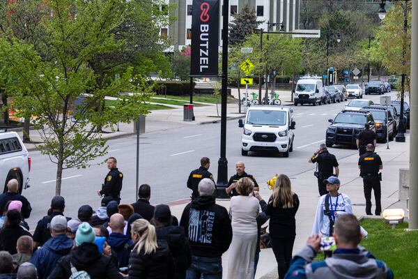 A van carrying former Grand Rapids Police officer Christopher Schurr arrives at the Kent County Courthouse in Grand Rapids, Mich. on Friday, May 2, 2025. (Joel Bissell /Kalamazoo Gazette via AP)