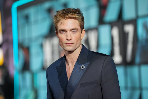 Robert Pattinson poses for photographers upon arrival at the World premiere for the film 'Mickey 17' on Thursday, Feb. 13, 2025, in London. (Photo by Scott A Garfitt/Invision/AP)