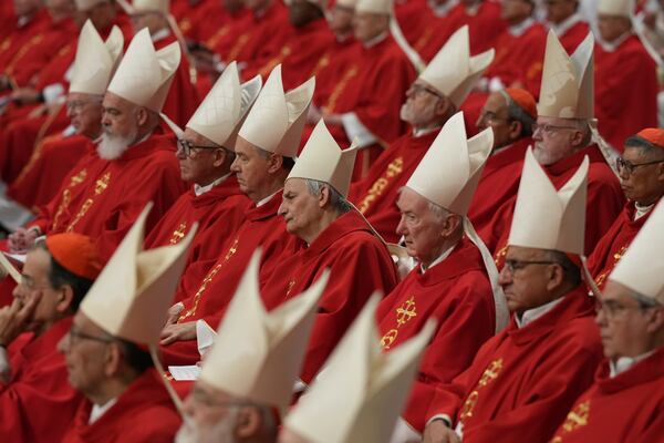 Cardinal Matteo Zuppi, centre, attends a mass on the third of nine days of mourning for late Pope Francis, in St. Peter's Basilica at the Vatican, Monday, April 28, 2025. (AP Photo/Andrew Medichini)