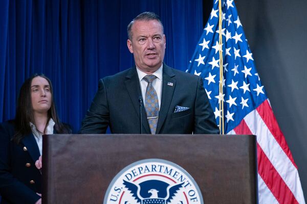 Acting director of U.S. Immigration and Customs Enforcement (ICE) Todd Lyons flanked by Deputy director of U.S. Immigration and Customs Enforcement Madison Sheahan, speaks during a news conference at ICE Headquarters, in Washington, Wednesday, May 21, 2025. (AP Photo/Jose Luis Magana)