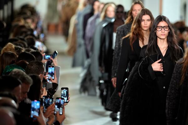 Models walk the runway during the Michael Kors Fall/Winter 2025 fashion show as part of New York Fashion Week on Tuesday, Feb. 11, 2025, at Terminal Warehouse in New York. (Photo by Charles Sykes/Invision/AP)