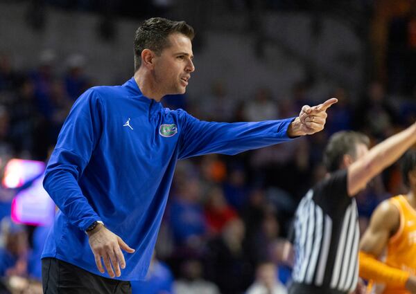 Florida head coach Todd Golden reacts during the first half of an NCAA college basketball game against Tennessee, Tuesday, Jan. 7, 2025, in Gainesville, Fla. (AP Photo/Alan Youngblood)