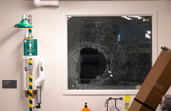 A shattered window is seen inside the Interdisciplinary Engineering Building on University of Washington's campus after pro-Palestinian protesters occupied the building, Tuesday, May 6, 2025, in Seattle. (Nick Wagner/The Seattle Times via AP)