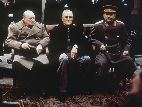 FILE - From left, British Prime Minister Winston Churchill, U.S. President Franklin Roosevelt and Soviet leader Josef Stalin sit on the patio of the Livadia Palace, in Yalta, Crimea, on Feb. 4, 1945. (AP Photo, File)