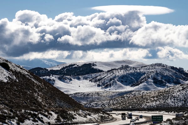 Snow covers the ground along the I-5 through Gorman and the Grapevine after Thursday's storm, on Friday, March 7, 2025. (David Crane/The Orange County Register via AP)