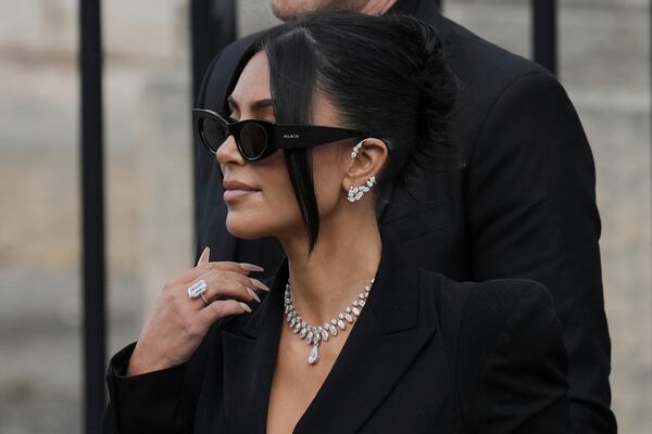 Kim Kardashian leaves the justice palace after testifying, regarding a robbery of millions of dollars in jewels from her Paris hotel room in 2016, in Paris, Tuesday, May 13, 2025. (AP Photo/Aurelien Morissard)