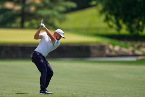 Bryson DeChambeau hits from the fairway on the seventh hole during the third round of the PGA Championship golf tournament at the Quail Hollow Club, Saturday, May 17, 2025, in Charlotte, N.C. (AP Photo/Matt York)