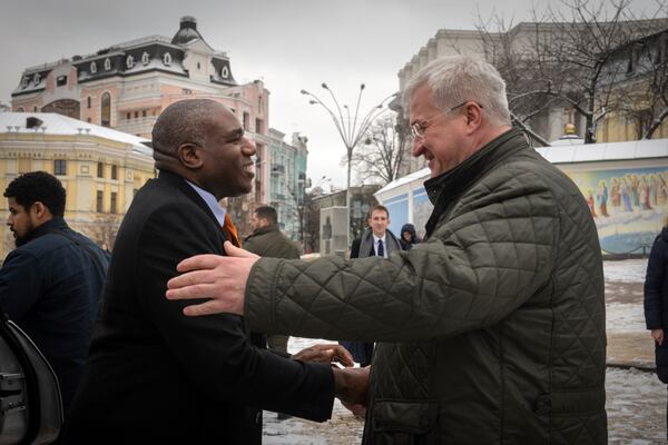 Britain's Foreign Secretary David Lammy, left, is greeted by Ukraine's Foreign Minister Andriiy Sybiha during their meeting in Kyiv, Ukraine, Wednesday, Feb. 5, 2025. (AP Photo/Efrem Lukatsky)