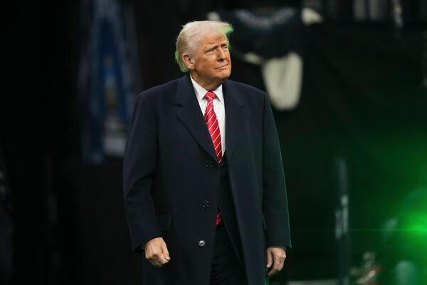 President Donald Trump attends the finals at the NCAA wrestling championship, Saturday, March 22, 2025, in Philadelphia. (AP Photo/Matt Rourke)