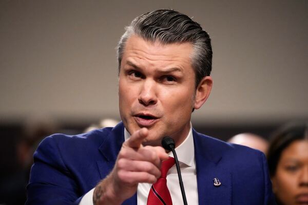 Pete Hegseth, President-elect Donald Trump's choice to be Defense secretary, appears before the Senate Armed Services Committee for his confirmation hearing, at the Capitol in Washington, Tuesday, Jan. 14, 2025. (AP Photo/Alex Brandon)