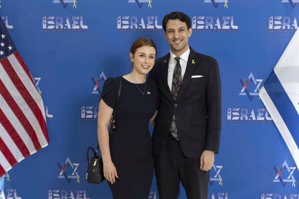 This undated handout photo provided by the embassy of Israel in the U.S. shows staff members of the Israeli Embassy in Washington, Israeli citizen Yaron Lischinsky, right, and U.S. citizen Sarah Milgrim. (Embassy of Israel in the U.S. via AP)