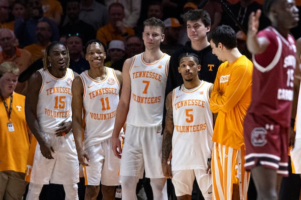 Tennessee seniors guard Jahmai Mashack (15), guard Jordan Gainey (11), Igor Milicic Jr. and guard Zakai Zeigler (5) watch play in the final seconds during the second half of an NCAA college basketball game against South Carolina, Saturday, March 8, 2025, in Knoxville, Tenn. (AP Photo/Wade Payne)