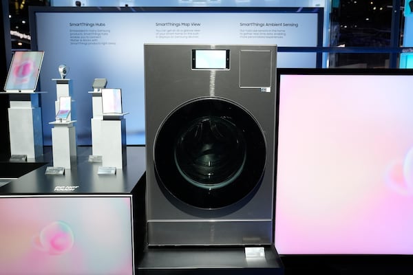 The Samsung Bespoke AI Washing Machine is displayed at a Samsung booth during the CES tech show Wednesday, Jan. 8, 2025, in Las Vegas. (AP Photo/Abbie Parr)