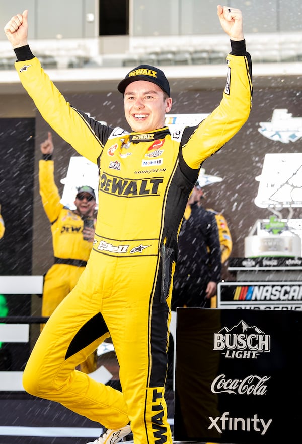 Christopher Bell celebrates his win during a NASCAR Cup Series auto race at Circuit of the Americas in Austin, Texas, Sunday, March 2, 2025. (AP Photo/Stephen Spillman)