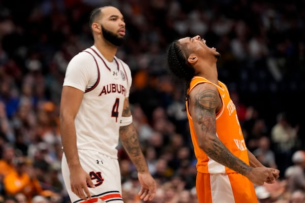 Tennessee guard Zakai Zeigler (5) celebrates during the second half of an NCAA college basketball game against Auburn in the semifinal round of the Southeastern Conference tournament, Saturday, March 15, 2025, in Nashville, Tenn. (AP Photo/George Walker IV)