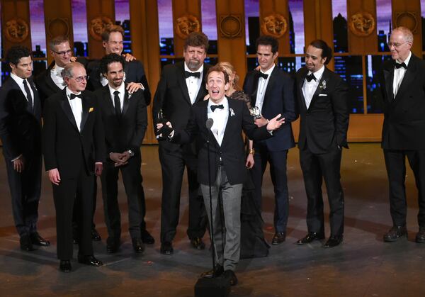 FILE - Jeffrey Seller, center, producer of the Broadway musical "Hamilton" accepts the award for best musical at the Tony Awards in New York on June 12, 2016. (Photo by Evan Agostini/Invision/AP, File)