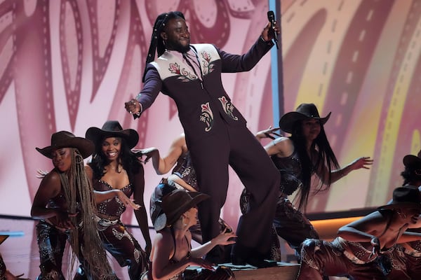 Shaboozey, center, performs a medley during the 67th annual Grammy Awards on Sunday, Feb. 2, 2025, in Los Angeles. (AP Photo/Chris Pizzello)