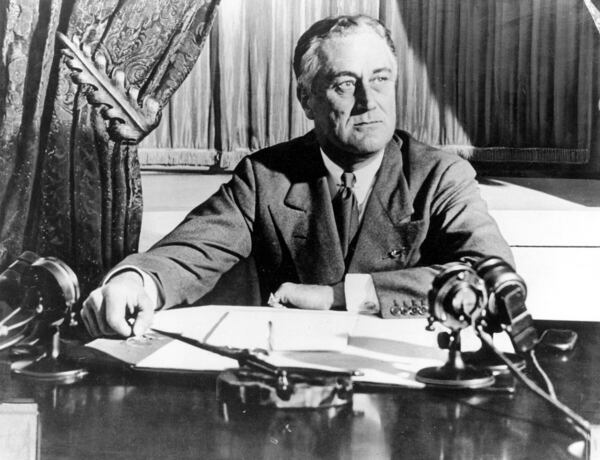 FILE - President Franklin D. Roosevelt delivers his first radio "Fireside Chat" in Washington in March 12, 1933. (AP Photo, File)