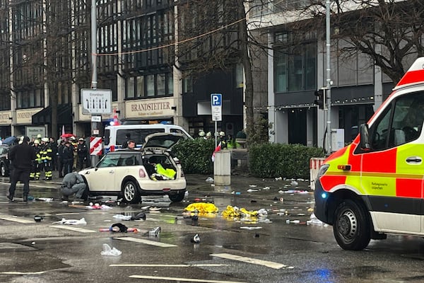 Emergency services attend the scene of an accident after a driver hit a group of people in Munich, Germany, Thursday Feb. 13, 2025. (Christoph Trost/dpa via AP)